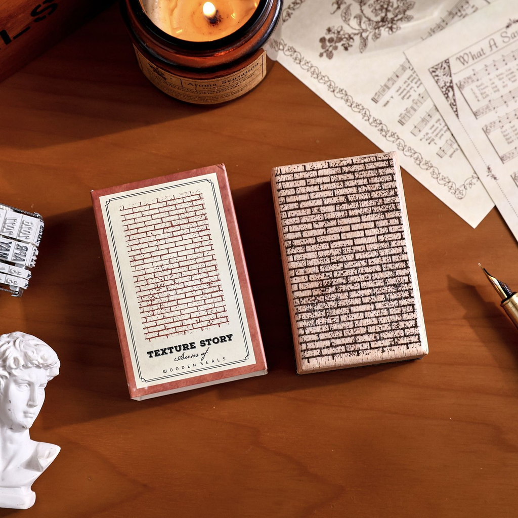 Brick Wall Texture Wooden Stamp with its packaging in the original styled photograph