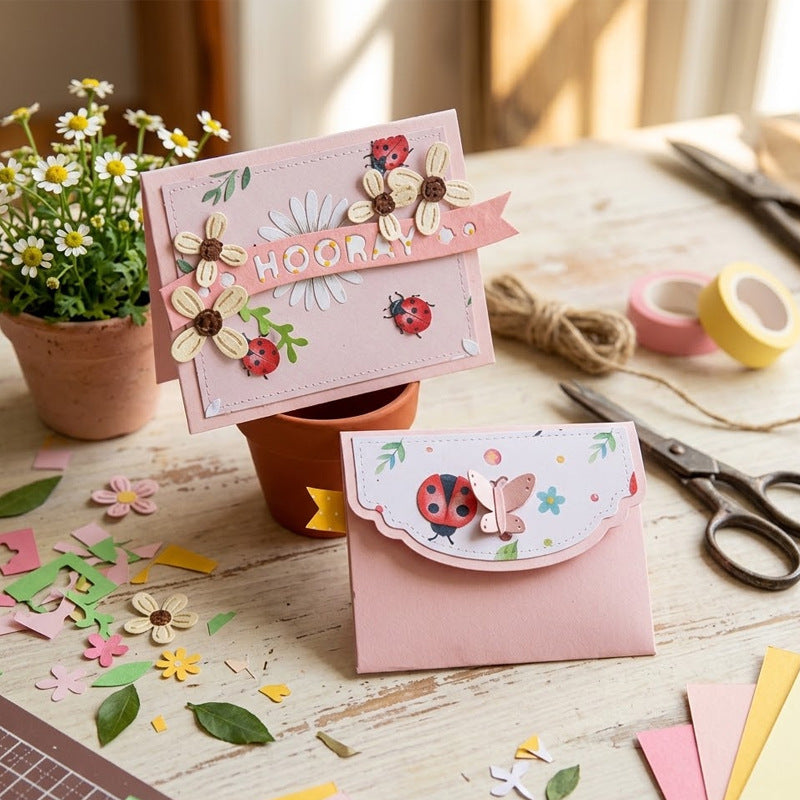 Example floral banner card and butterfly pocket; finished crafts and props not included