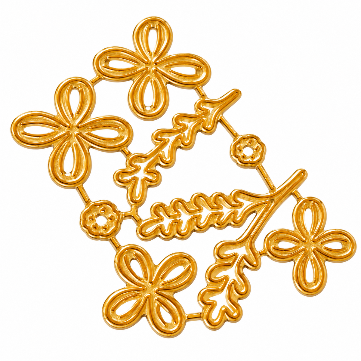 Gold metal flower and leafy branch cutting dies on a white background