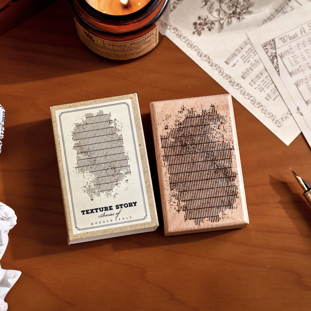 Distressed Crosshatch Wooden Stamp with its packaging in the original styled photograph