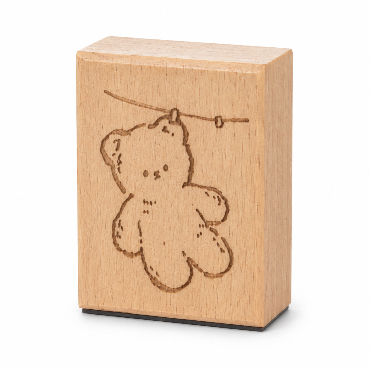 Drying Bear beech wood rubber stamp on pure white background