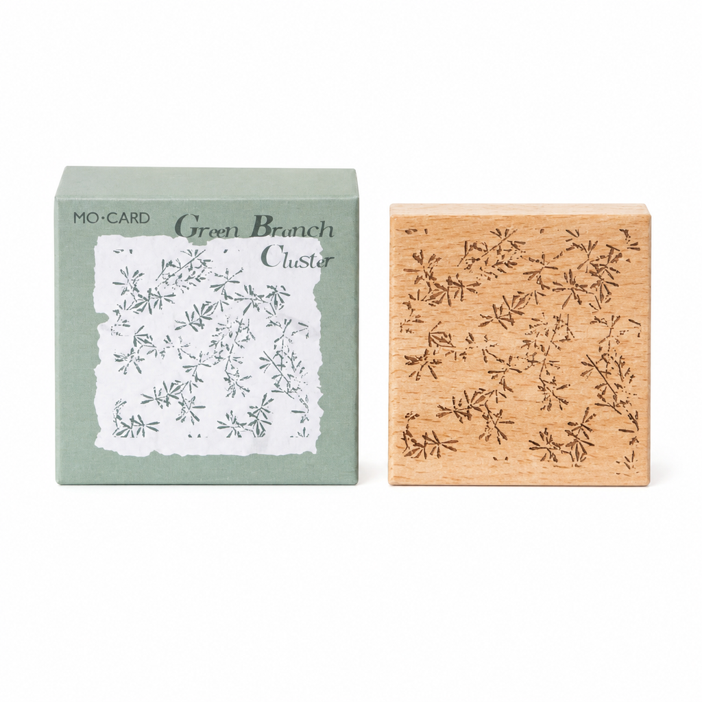 Green branch cluster wooden rubber stamp with retail box on white background