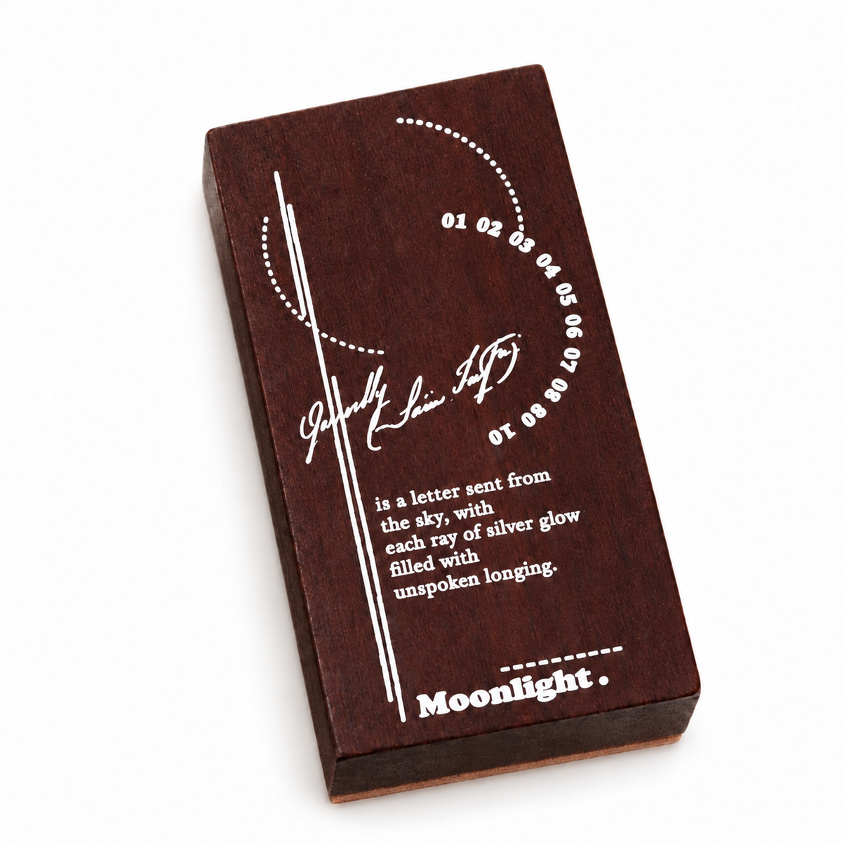 Moonlight Typography Wooden Stamp lying flat with the stamping layer beneath the wooden block