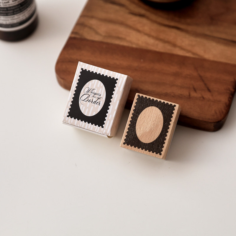 Postage Oval Frame Wooden Stamp with packaging in the original photograph