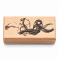 Swirling Mist Wooden Stamp showing flowing curls of mist rendered with a dotted halftone texture on a white background
